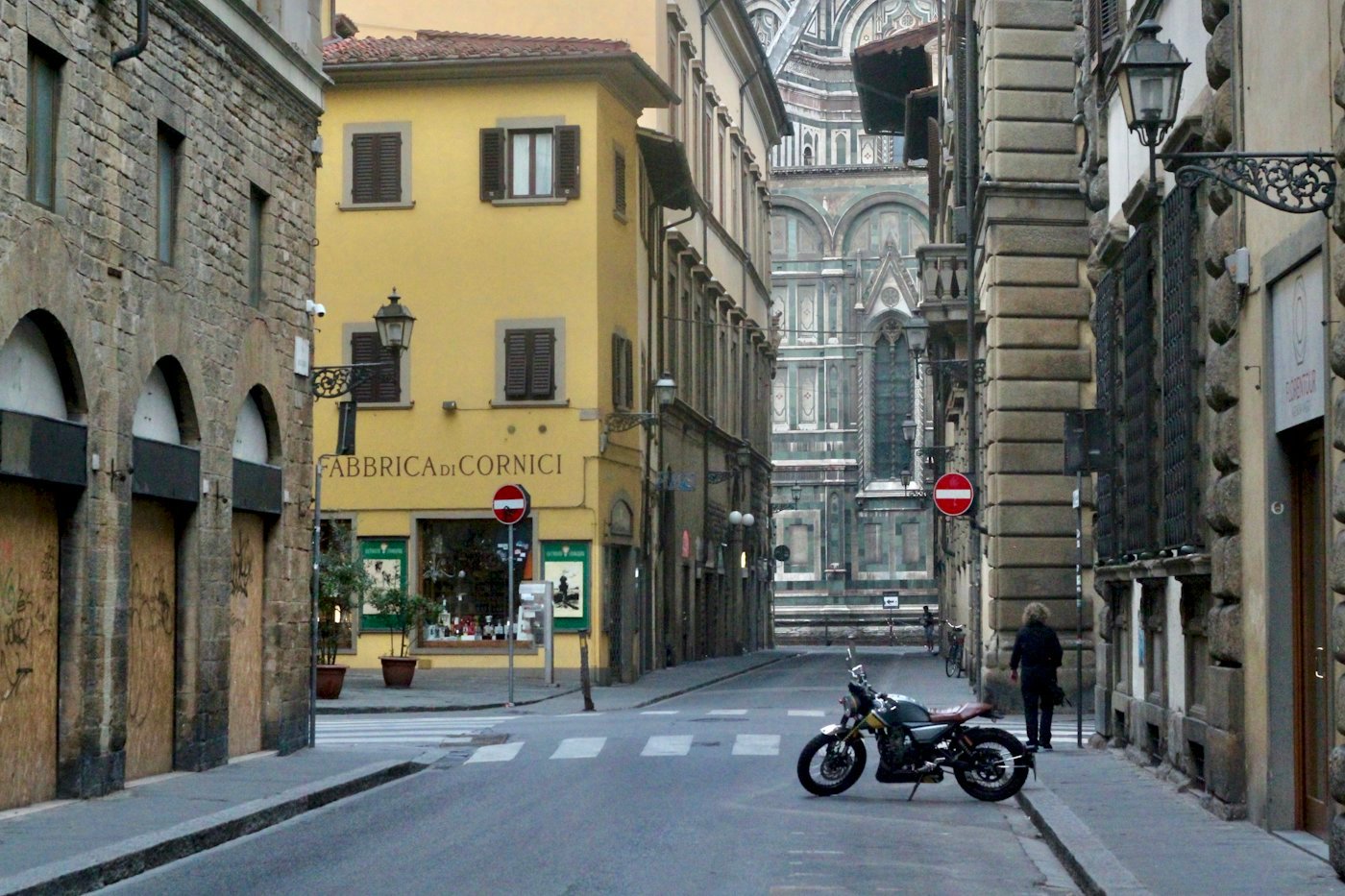 A street in the historic centre of Florence, with the cathedral at the far end