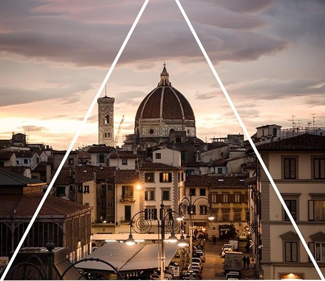 The Duomo of Florence at sunset, seen over the rooftops